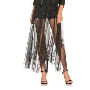 Free People Brightest Star Sheer Maxi Skirt in black with glitter details.